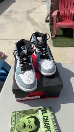 Nike Air Jordan 1 Retro High OG University Blue sneakers.