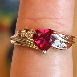 10k Solid Gold Ring With Ruby And 4 Diamonds. 1.9g.