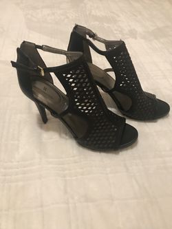 Woman’s Black High Heels/Boots