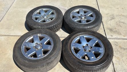 Jeep liberty 17 Inch chrome clad Aluminum wheels with old tires 5x4.5 Lug pattern