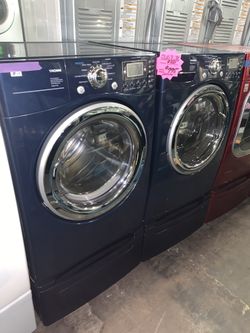 LG front load washer and electric dryer with pedestals in excellent connditon with 4 months warranty