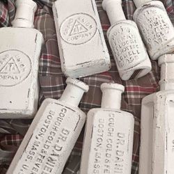 Vintage Cast Iron Bottles