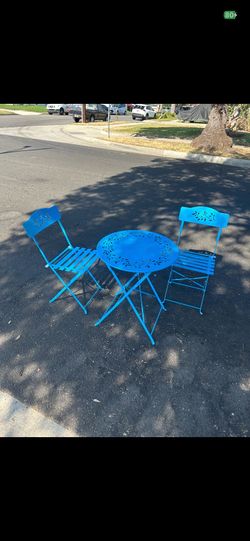 Brand new Italian style patio table, and chair set for $80