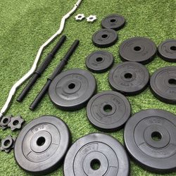 Gym Equipment with Adjustable 40 Pound Dumbbells and Curved Bar