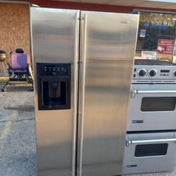 Jenn-Air Stainless Steel Double Door Refrigerator With The Double Stove