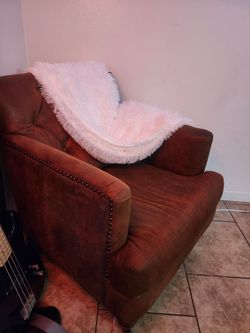 2 brown chairs