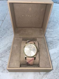 Burberry gold tone women’s watch