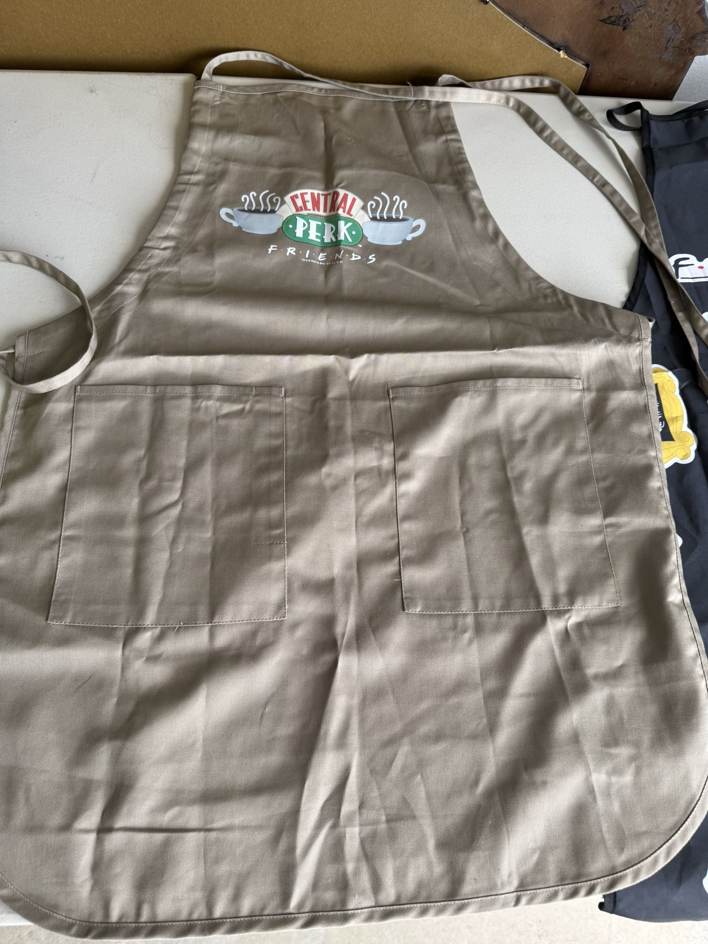 Friends Show Baking And Cooking Aprons