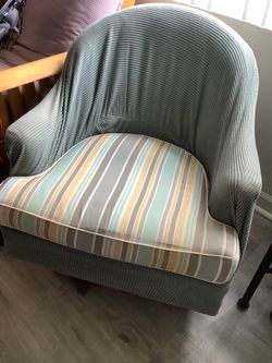 (2) barrel-type swivel chairs with reupholstered cushions