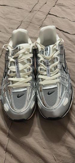 Brand new silver Nikes