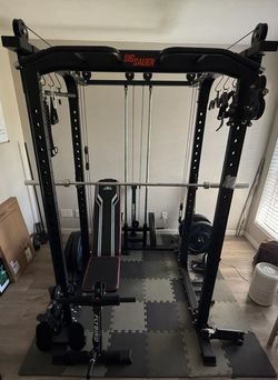 Squat rack w/ cable towers & extras