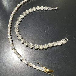 TWO BEAUTIFUL CUSTOM BRACELET ONE SILVER TONE AND THE OTHER GOLD TONE WITH DIAMONDS CZ
