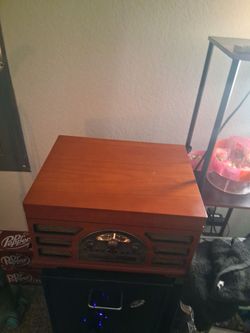 Its a cd player and record player with fm and am radio