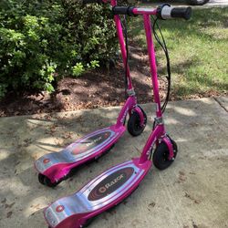 2 Pink Electric Razor Scooters