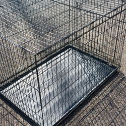 Large pet crate good condition.