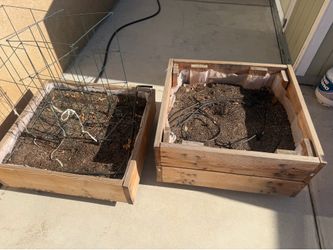 2 planter boxes on wheels