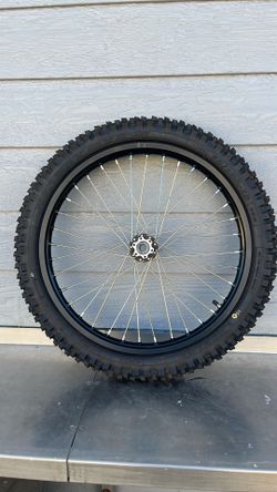 Surron front rim and tire