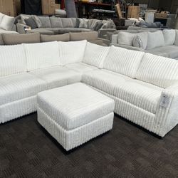 Ivory White Sectional And Ottoman 