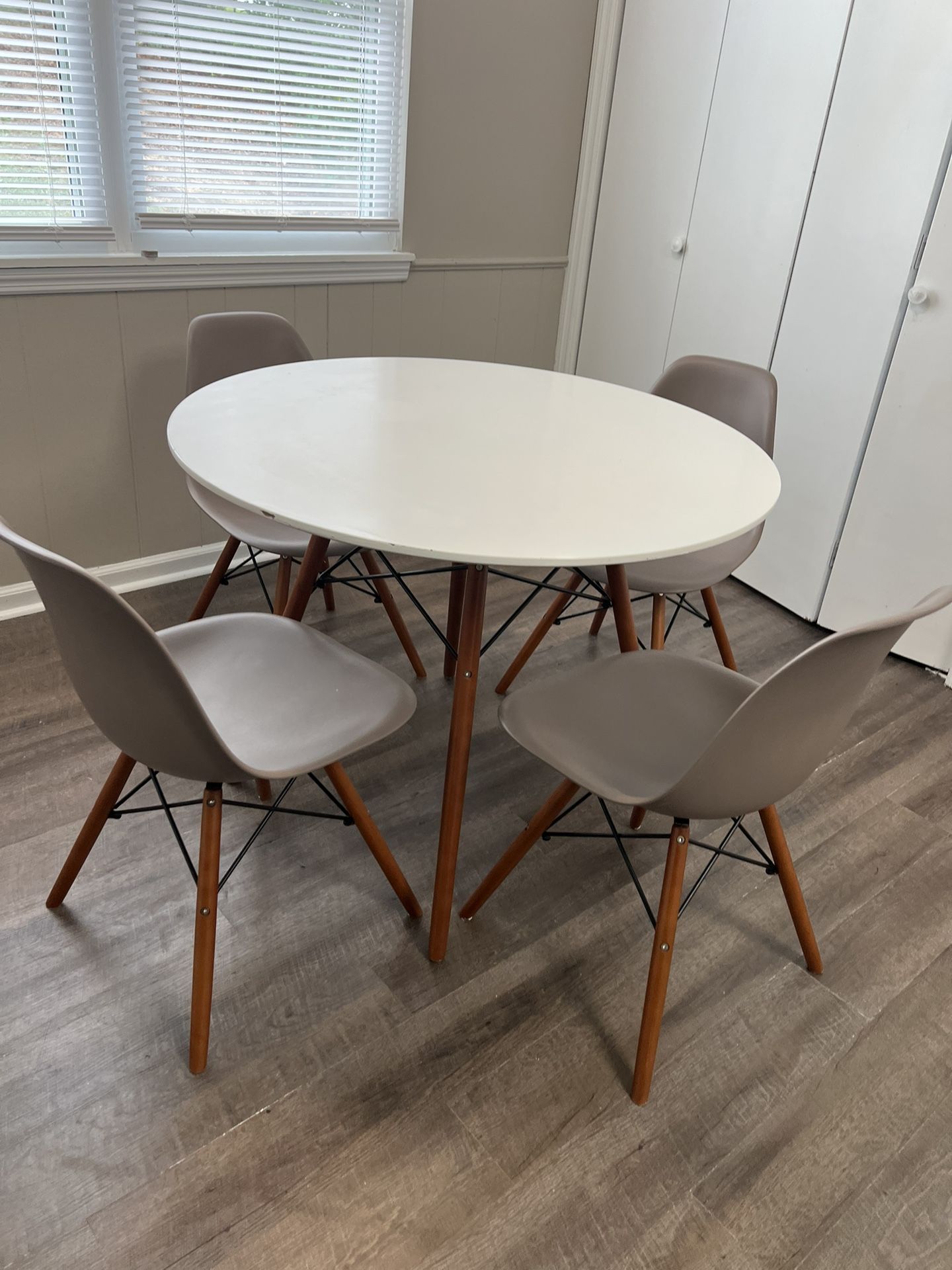 A Table And 4 Chairs