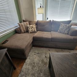 Couch with attached chase and matching chair with large ottoman