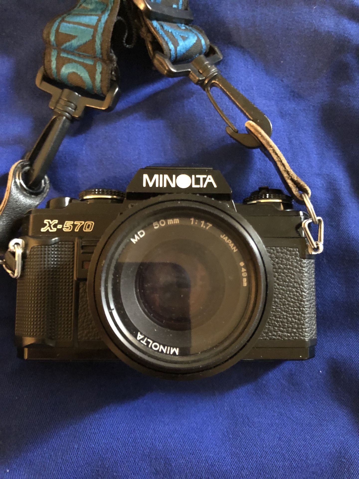 Minolta X-570 with 50mm lens and Extras
