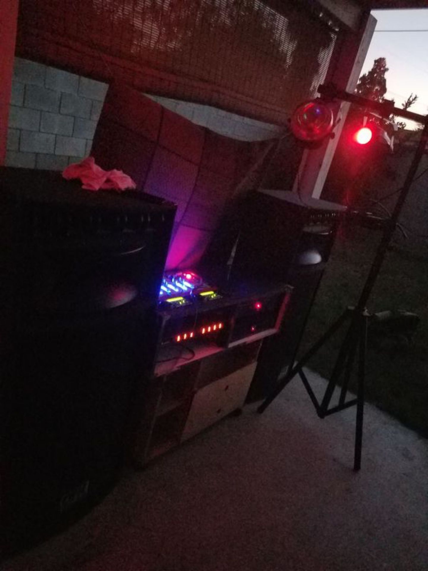 DJ Setup with Speakers, Strobe lights, and Mixer