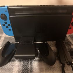 Nintendo Switch With Accessories And A Game