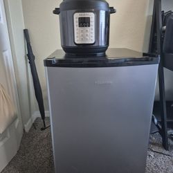 Mini Refrigerator And Pressure Cooker