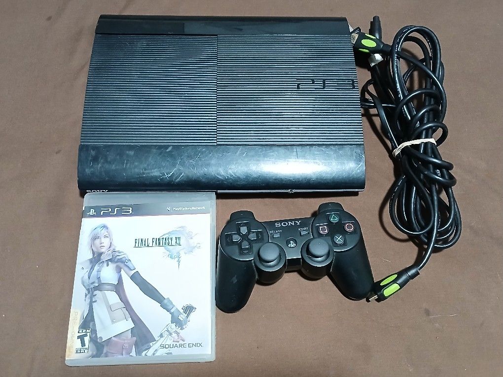 Playstation 3 PS3 Super Slim Console With Controller And Game. Works
