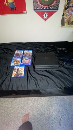 🎮 PS4 Pro Bundle – 2 Controllers + 5 Games (Great Condition)