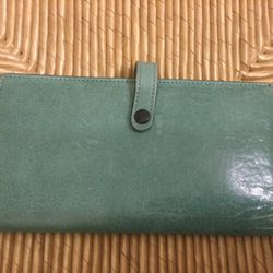 Turquoise aqua colored leather wallet