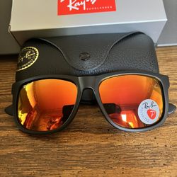 Ray Ban Justin’s 54mm.  Black Frame with Polarized Red Flash Mirror Lenses. Brand New & Authentic. 