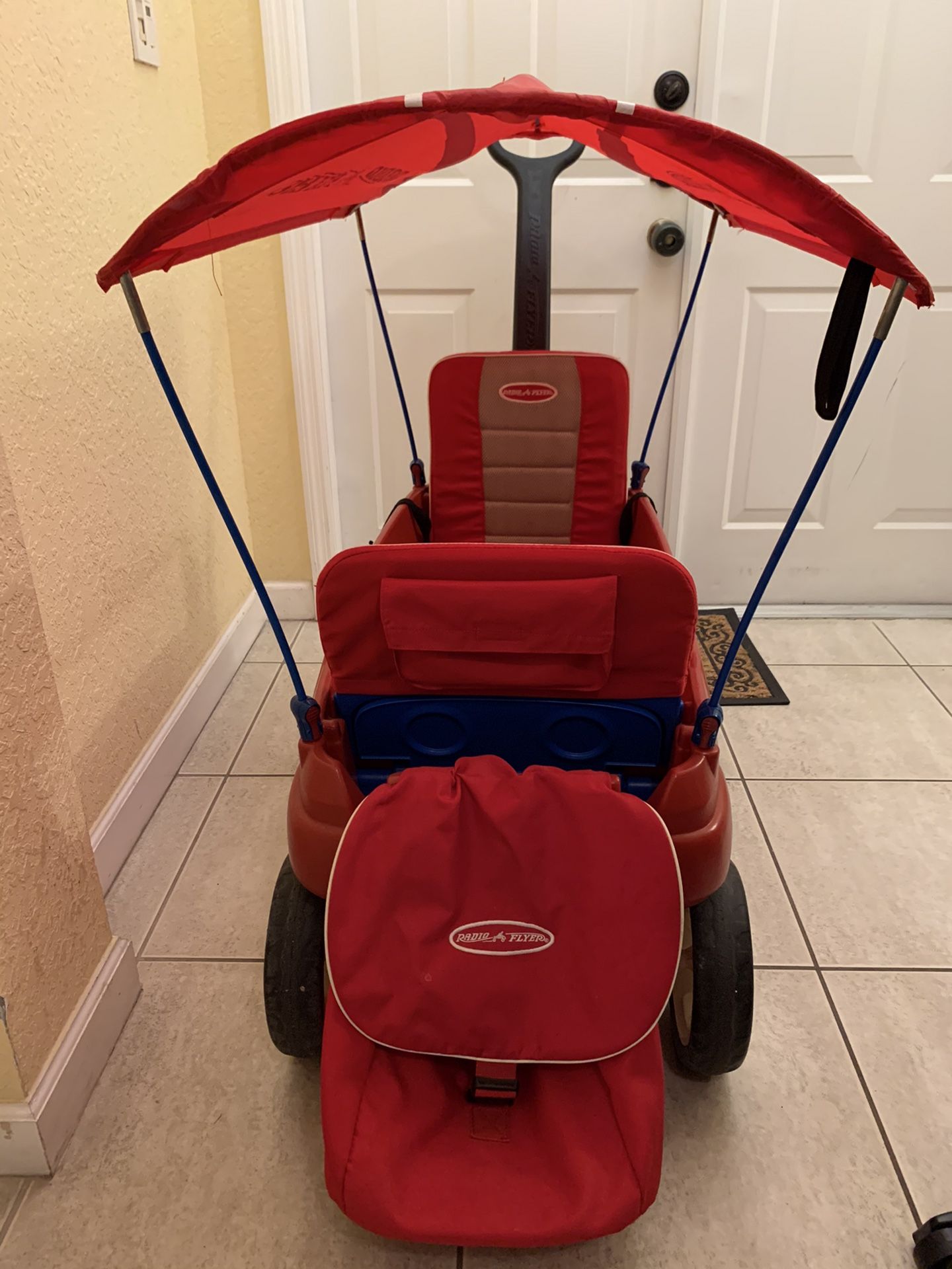 Radio Flyer Wagon with all the upgrades. Cushion seats, carrying back