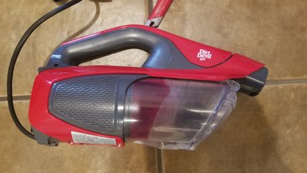 Dirt devil with attachments and bag.