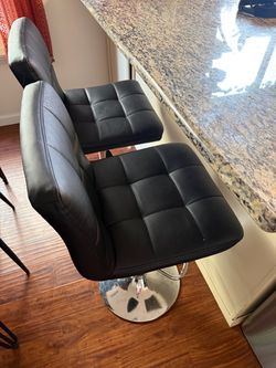 Pair of adjustable bar chairs