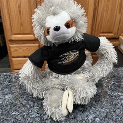Collectible NHL Forever Plush Sloth In Anaheim Ducks T Shirt.  Size  Approximately 14 Inches Tall.  Preowned very good condition .