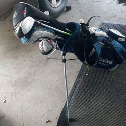 Several Golf Clubs And Bags With Accessories.  Read Description 