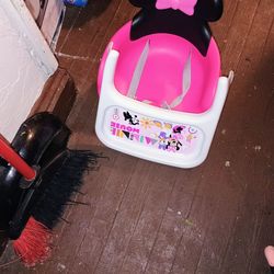 Minnie mouse booster chair with attached straps