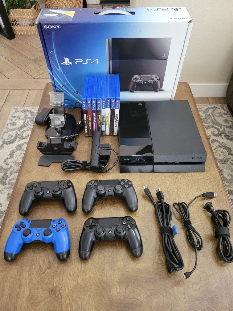 PS4 with Accessories and Games