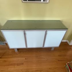 Glass topped modern sideboard