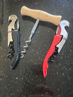 3 cork bottle openers