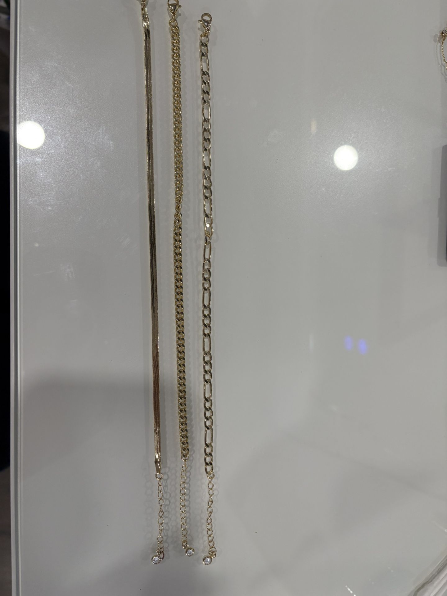 Gold ankle bracelets