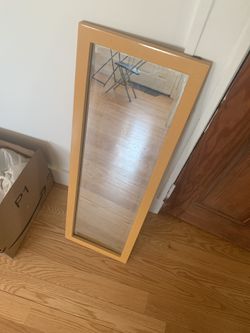 Mirror with wood frame