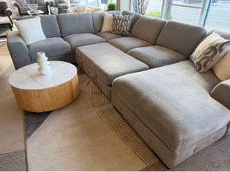 Wraparound Sectional with pull out bed and storage chaise ( Modern Home Furniture)