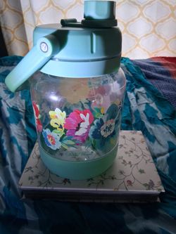 Pioneer woman jug 0.74 gallon.