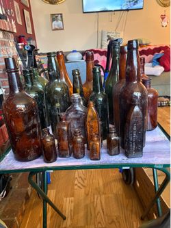 21 -assorted brown glass bottles vintage