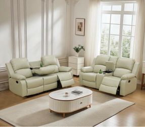 Beige leather fully reclining couch and love seat