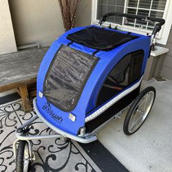 large blue pet dog stroller and bike trailer. 