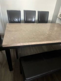Dining table with 4 chairs and a bench