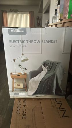 Electric throw blanket